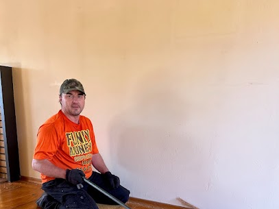 Man removing flooring