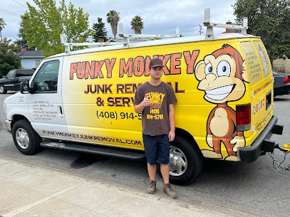 Young man smiling in front of a van